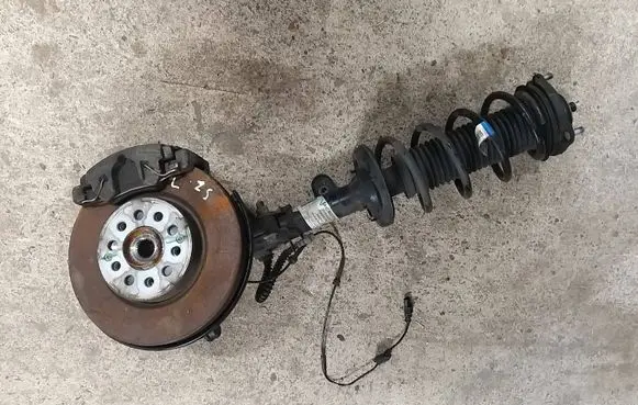 Front wheel hub spindle knuckle
