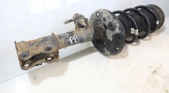 Front shock absorber with coil spring