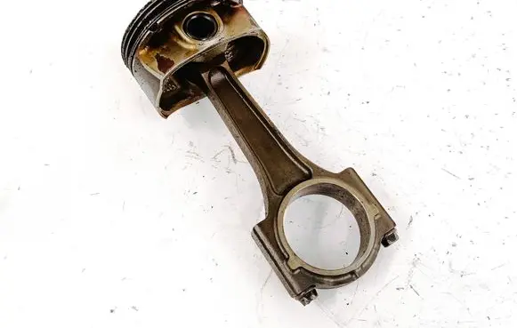 Piston with connecting rod