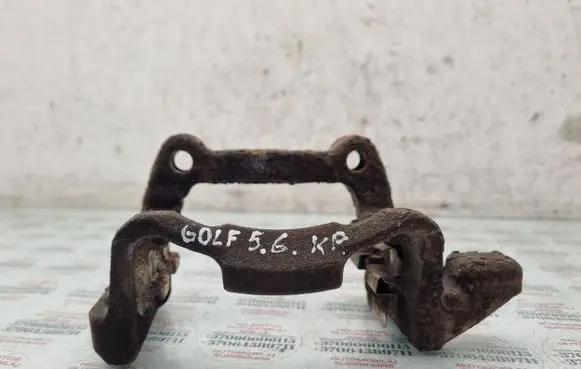 Volkswagen Golf V Brake caliper pad carrier rear 