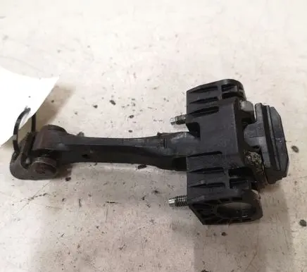 Front door check strap stopper