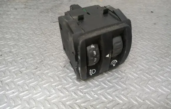 Headlight level height control switch