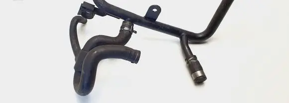 Volkswagen PASSAT B5.5 Engine coolant pipe/hose 06B121065L