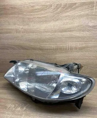 Mazda 323 Headlight/headlamp Mazda323BJ 1999year E13