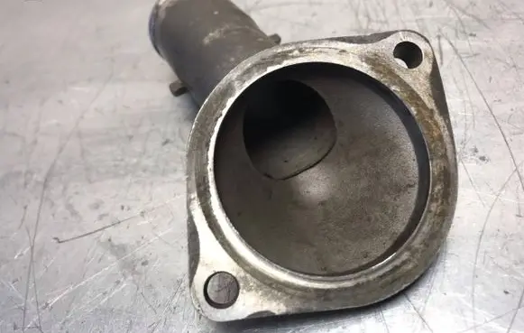 Thermostat/thermostat housing