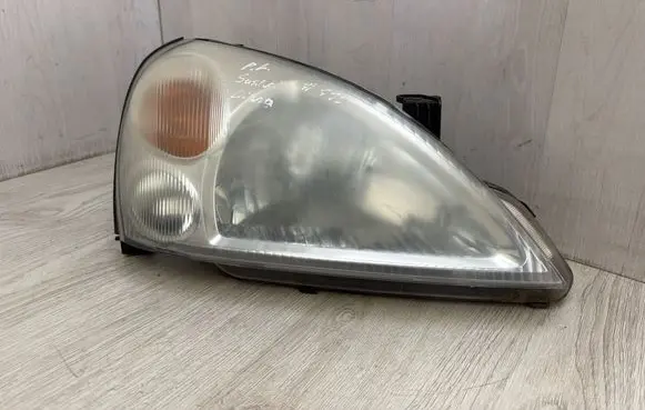 Suzuki Liana Headlight/headlamp 10032662