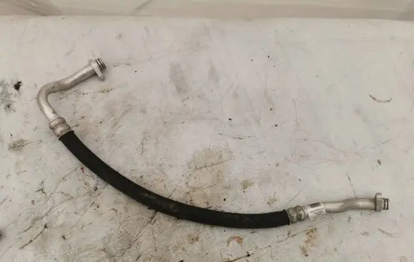 Citroen Berlingo Air conditioning (A/C) pipe/hose 9822435580
