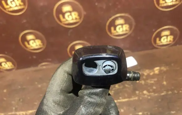 Headlight washer spray nozzle cap/cover