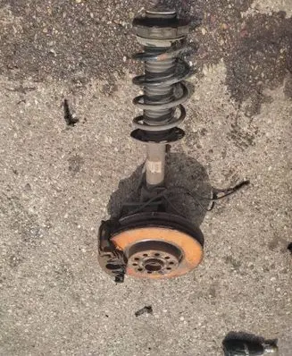 Front wheel hub spindle knuckle