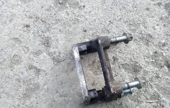 Opel Astra G Brake caliper pad carrier rear 