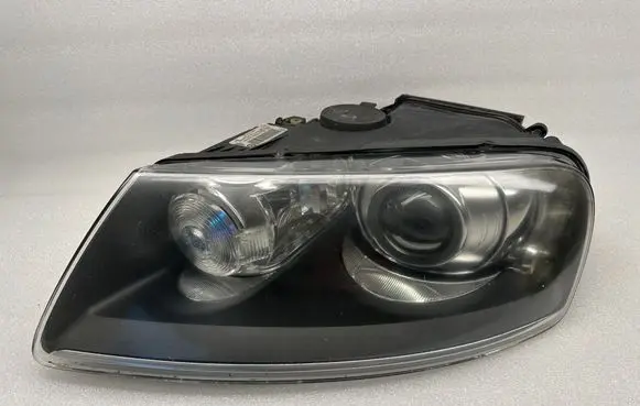 Volkswagen Touareg I Headlight/headlamp 7L6941015CM 89311931
