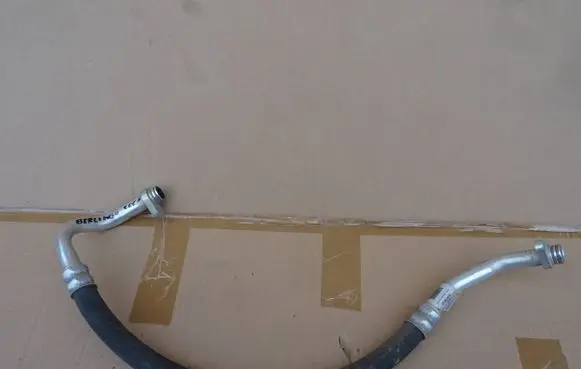 Citroen Berlingo Air conditioning (A/C) pipe/hose 9822435580