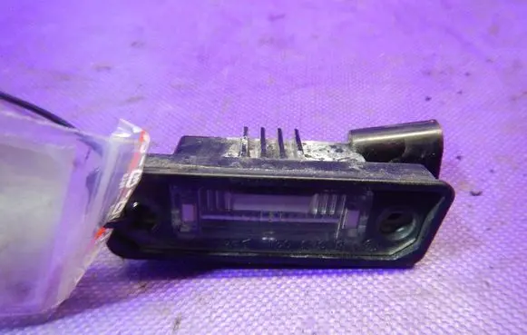Volkswagen PASSAT B5.5 Number plate light 1J6943021B