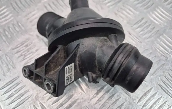 Thermostat/thermostat housing