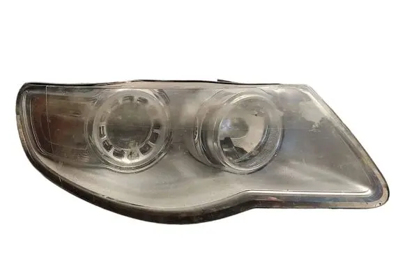 Volkswagen Touareg I Headlight/headlamp 7L6941032A 1LL24703204