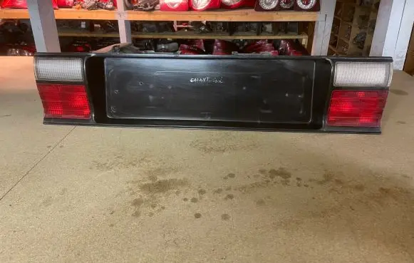 Mitsubishi Galant Trunk door license plate light bar MB567150 567150