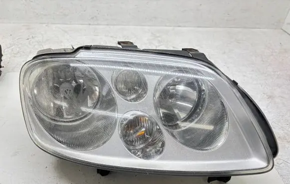 Volkswagen Touran I Headlight/headlamp 1T0941006R