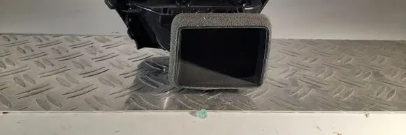 Nissan Leaf II (ZE1) Dash center air vent grill 687615SA0B