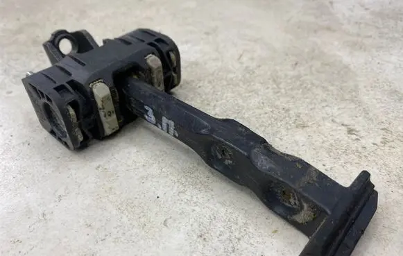 Volvo V70 Rear door check strap stopper 
