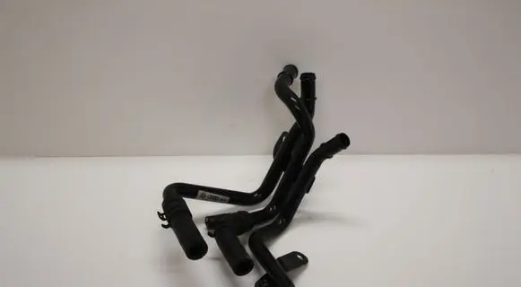 Volkswagen Golf VII Engine coolant pipe/hose 04L121064A