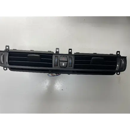 Dash center air vent grill