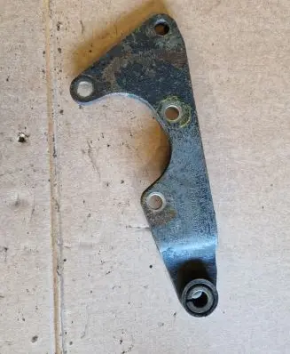 Volkswagen PASSAT B3 Power steering pump mounting bracket 037145521