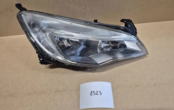 Opel Astra J Headlight/headlamp 13253647 1EG01001102