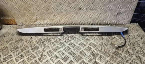 Toyota Sienna XL20 II Trunk door license plate light bar 76801AE011