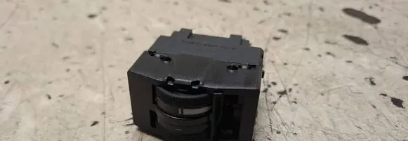 Headlight level height control switch