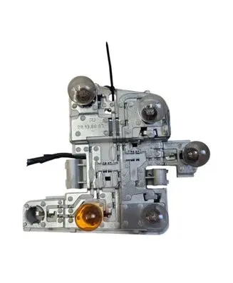 Tail light bulb cover holder