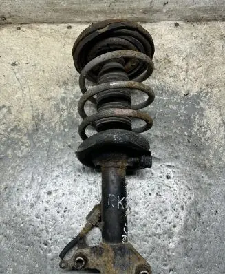 Nissan Primera Front shock absorber with coil spring