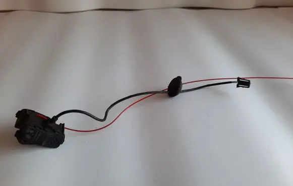 Fuel tank cap lock motor