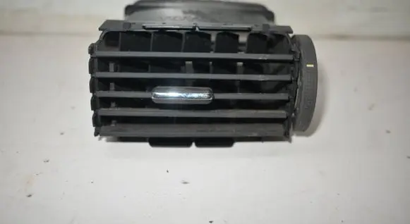 Dash center air vent grill