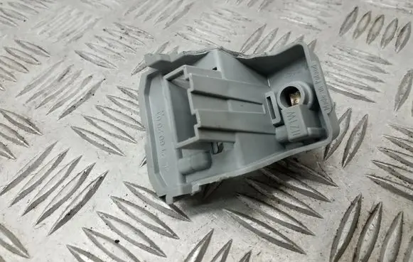 Tail light bulb cover holder