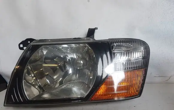 Mitsubishi Pajero Headlight/headlamp 10087419