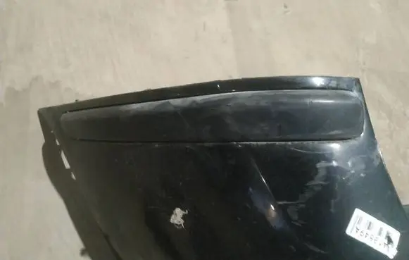 Rear bumper trim bar molding