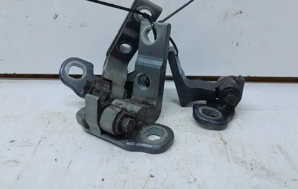 Front door lower hinge