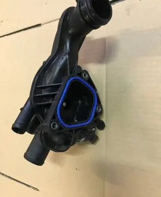 Thermostat/thermostat housing