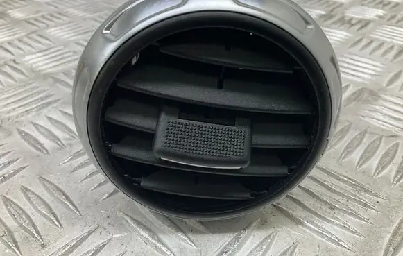 Dash center air vent grill