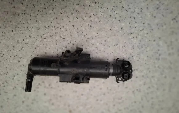 Ford Kuga II Headlight washer spray nozzle GV4113L014AE