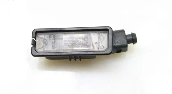 Volkswagen PASSAT B7 Number plate light 1K8943021