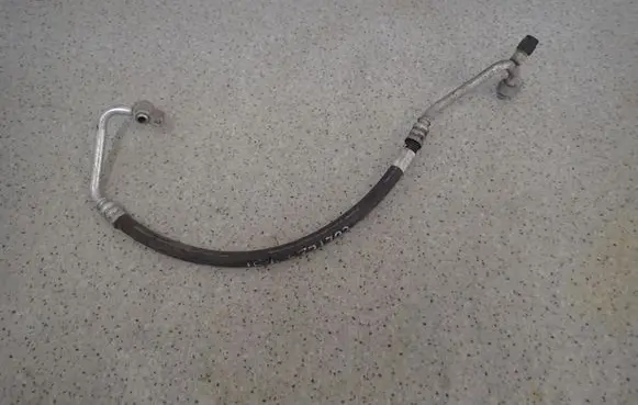 Mitsubishi Colt Air conditioning (A/C) pipe/hose MR568981