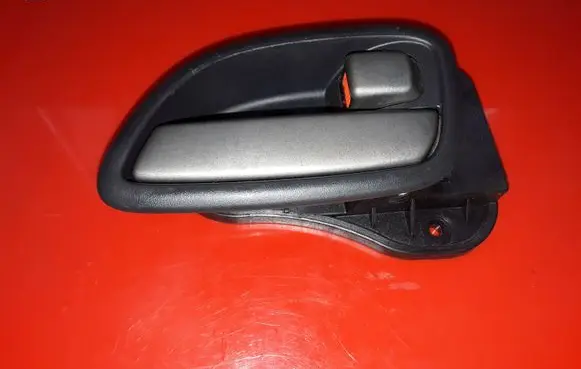 KIA Carens II Front door interior handle NOCODE