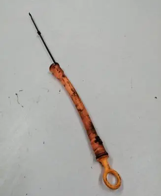 Oil level dip stick