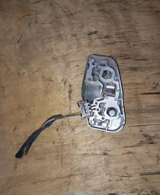 Tail light bulb cover holder