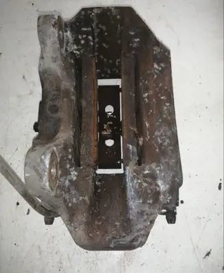 Volkswagen Touareg I Front brake caliper 209236052A
