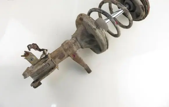 Honda FR-V Front shock absorber with coil spring
