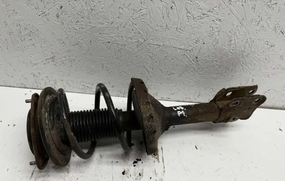 Subaru Outback Front shock absorber with coil spring