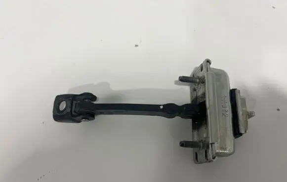Front door check strap stopper