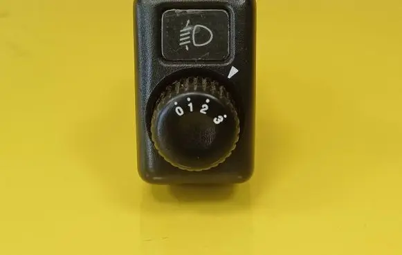 KIA Retona Headlight level height control switch